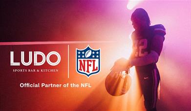 Ludo Official Partner of NFL with an American Football Player