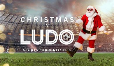 Christmas at Ludo with Santa kicking at football