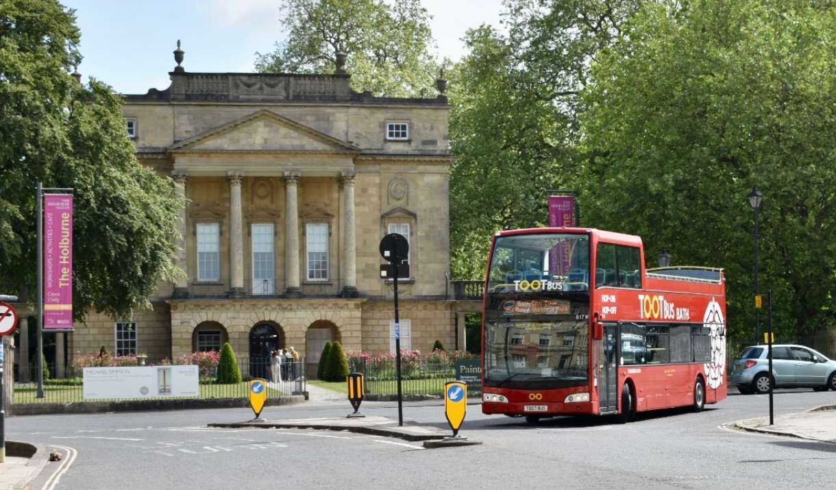 A Tootbus Bath open-top bus outside The Holburne Museum, Bath