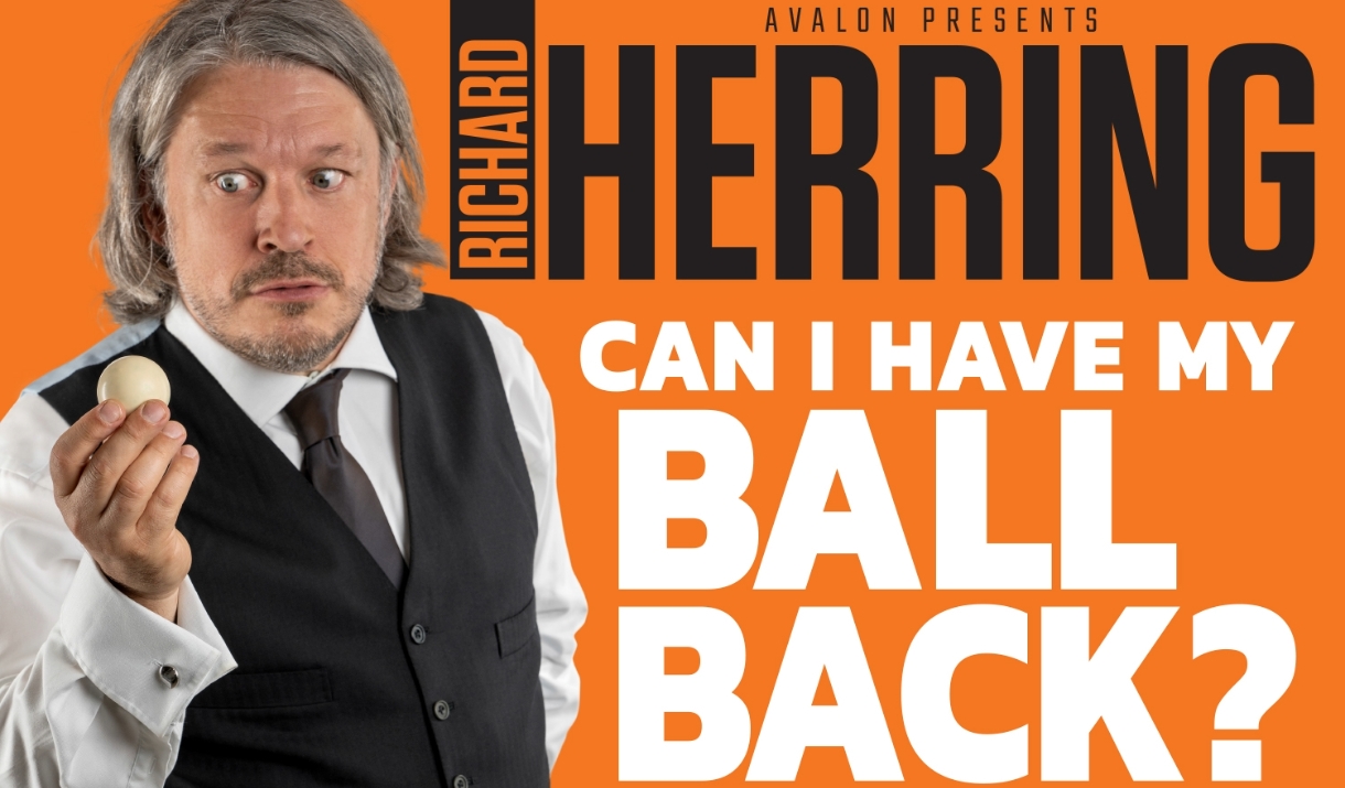 Richard Herring holding a ball