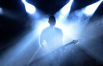 Lights on a single guitarist