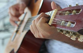 Guitar being played