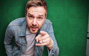 Iain Stirling pointing at the camera