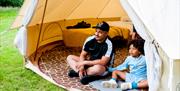 Family in bell tent