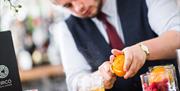 Bartender making drinks
