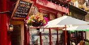 Red building and white umbrellas