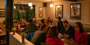 People sat inside the bar at Ring o’ Bells
